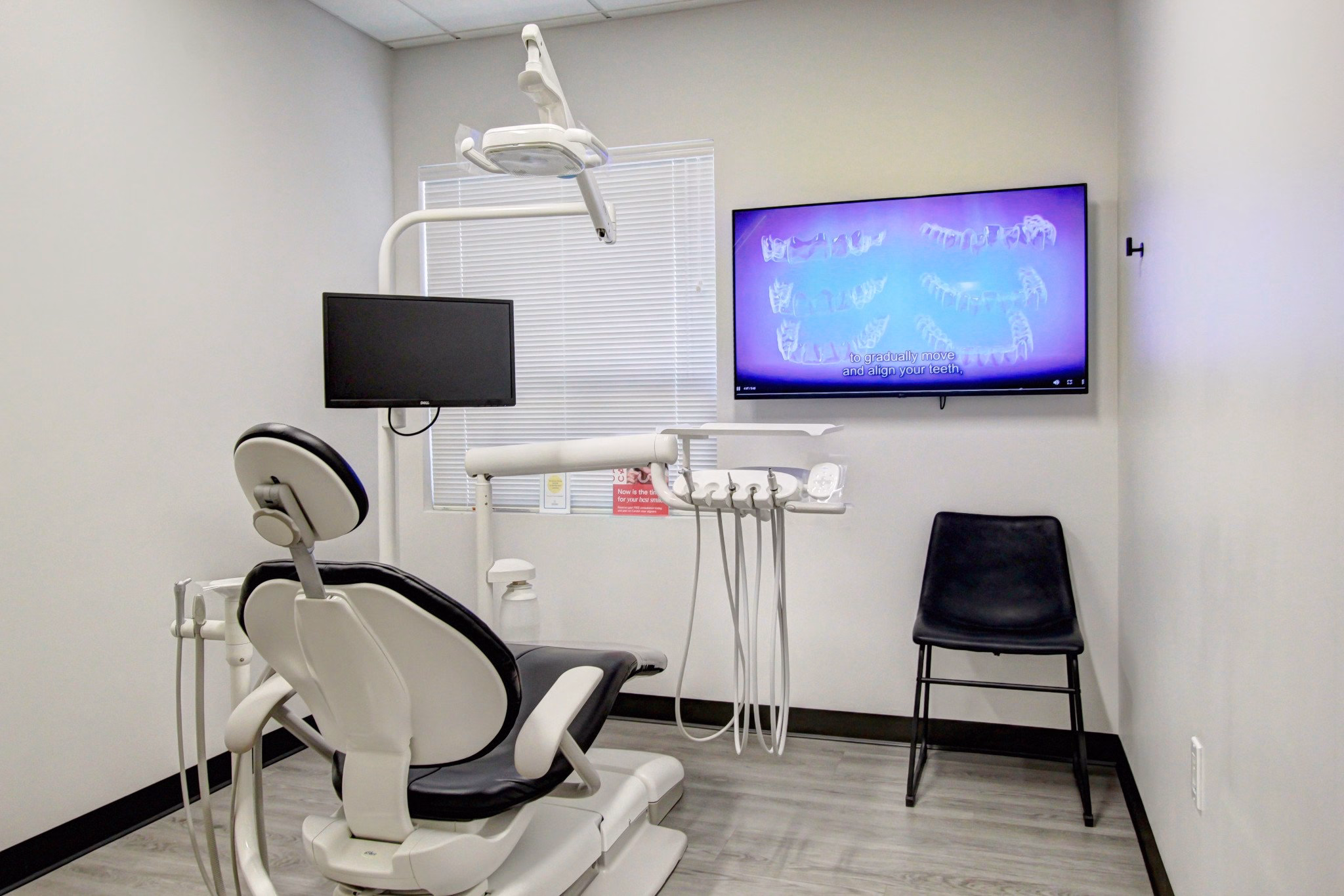 How Often Should You Visit the Dentist for Optimal Oral Health? 1 Dental operatory with patient chair and digital screen displaying teeth alignment at Kirkland Family Dentistry in Kirkland, WA